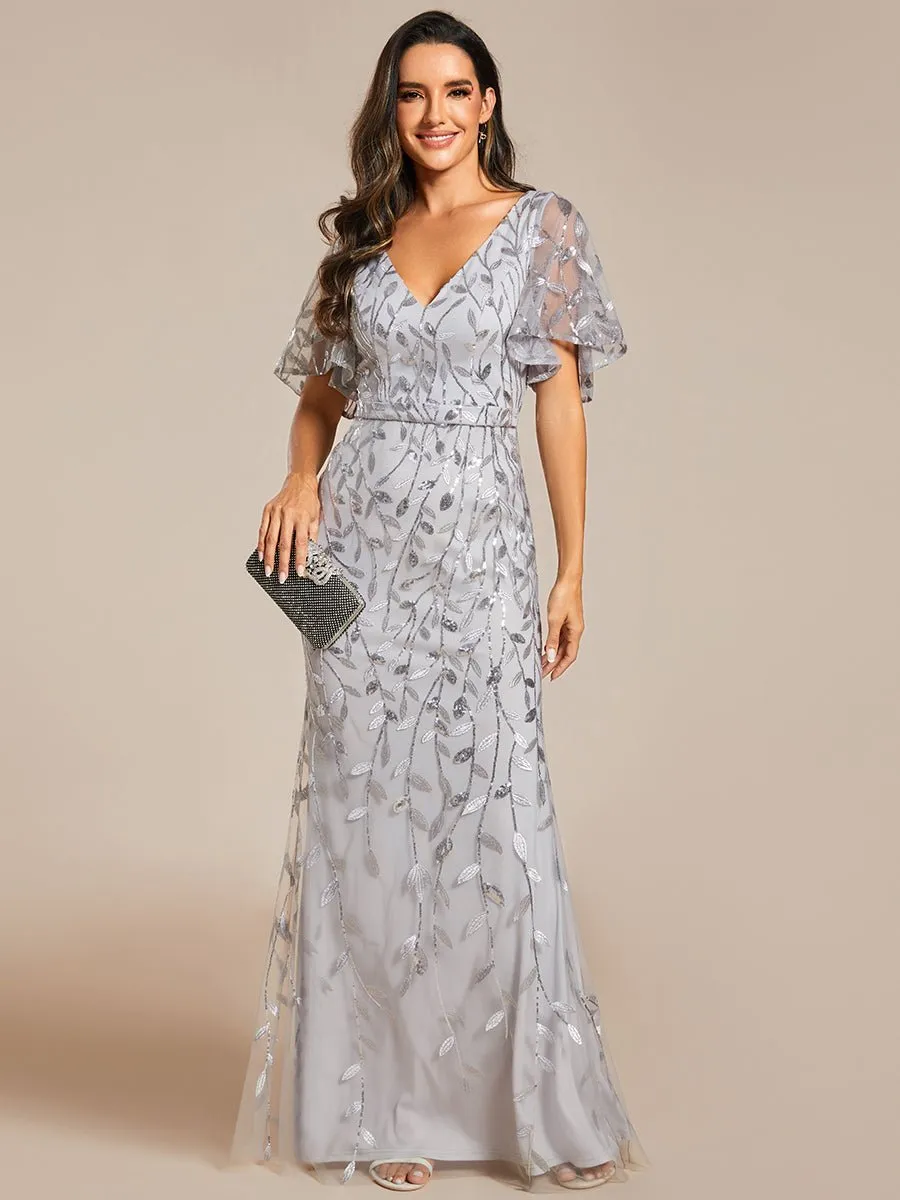 Eliza tulle sleeve black gown with gold leaf patterns Express NZ wide