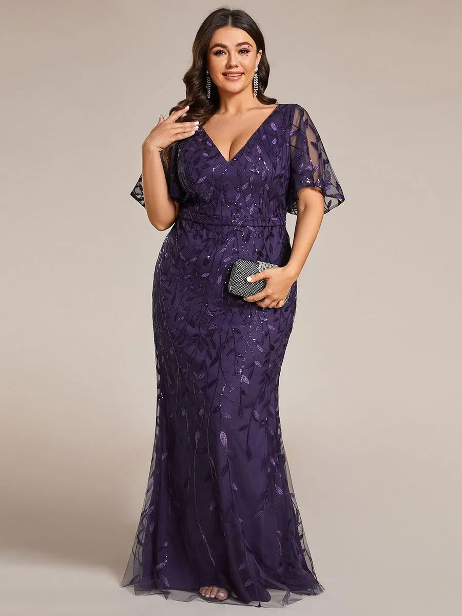 Eliza tulle sleeve black gown with gold leaf patterns Express NZ wide