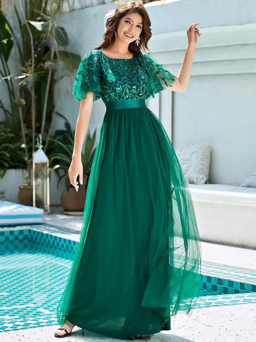 Georgia flutter sleeve tulle dress in emerald Express NZ wide
