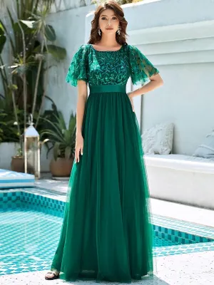 Georgia flutter sleeve tulle dress in emerald Express NZ wide