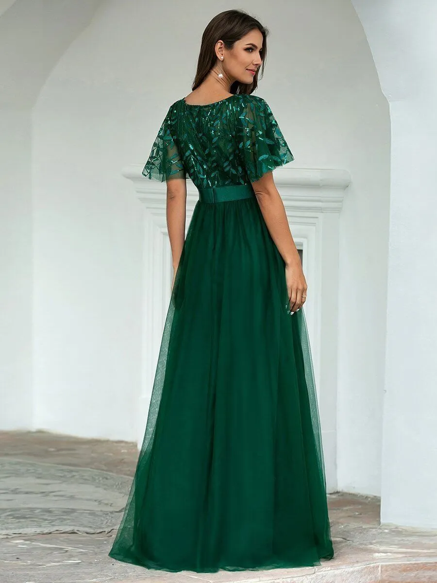 Georgia flutter sleeve tulle dress in emerald Express NZ wide