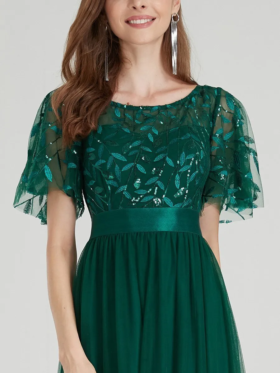 Georgia flutter sleeve tulle dress in emerald Express NZ wide
