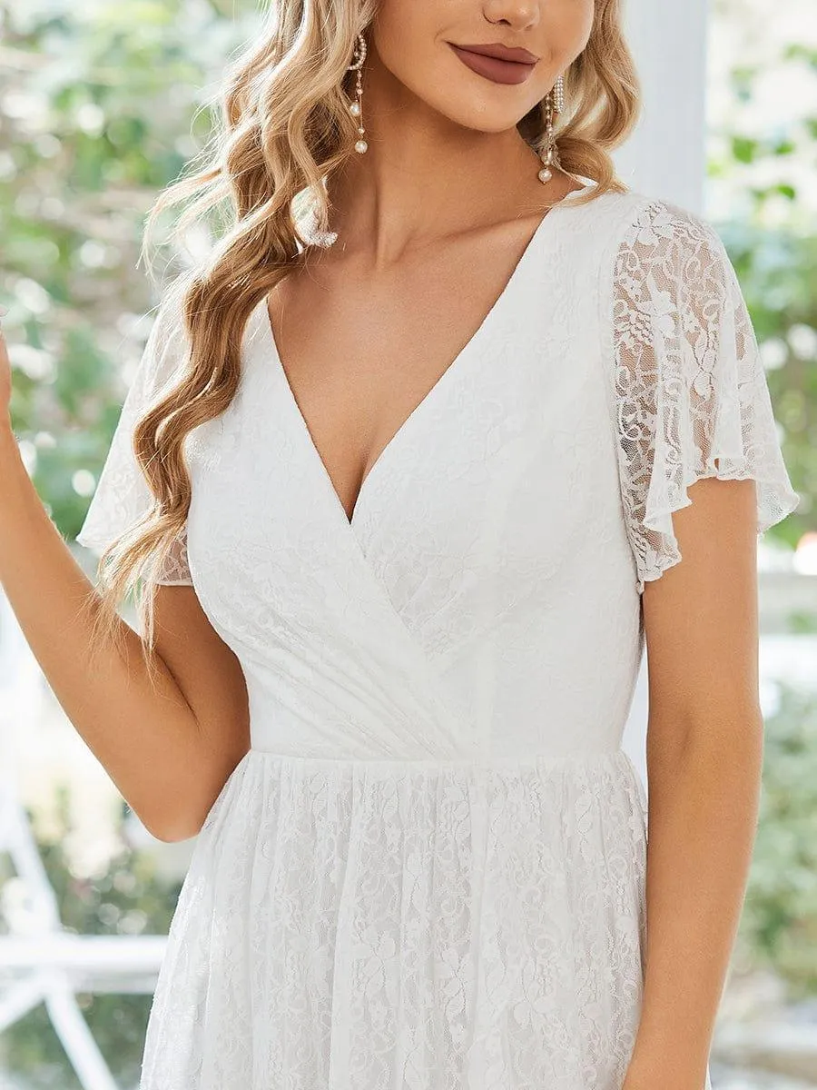Robe de soirée en dentelle plissée à manches courtes et col en V